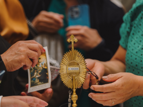 The Faithful Flock To Christ Cathedral For Hope, Healing